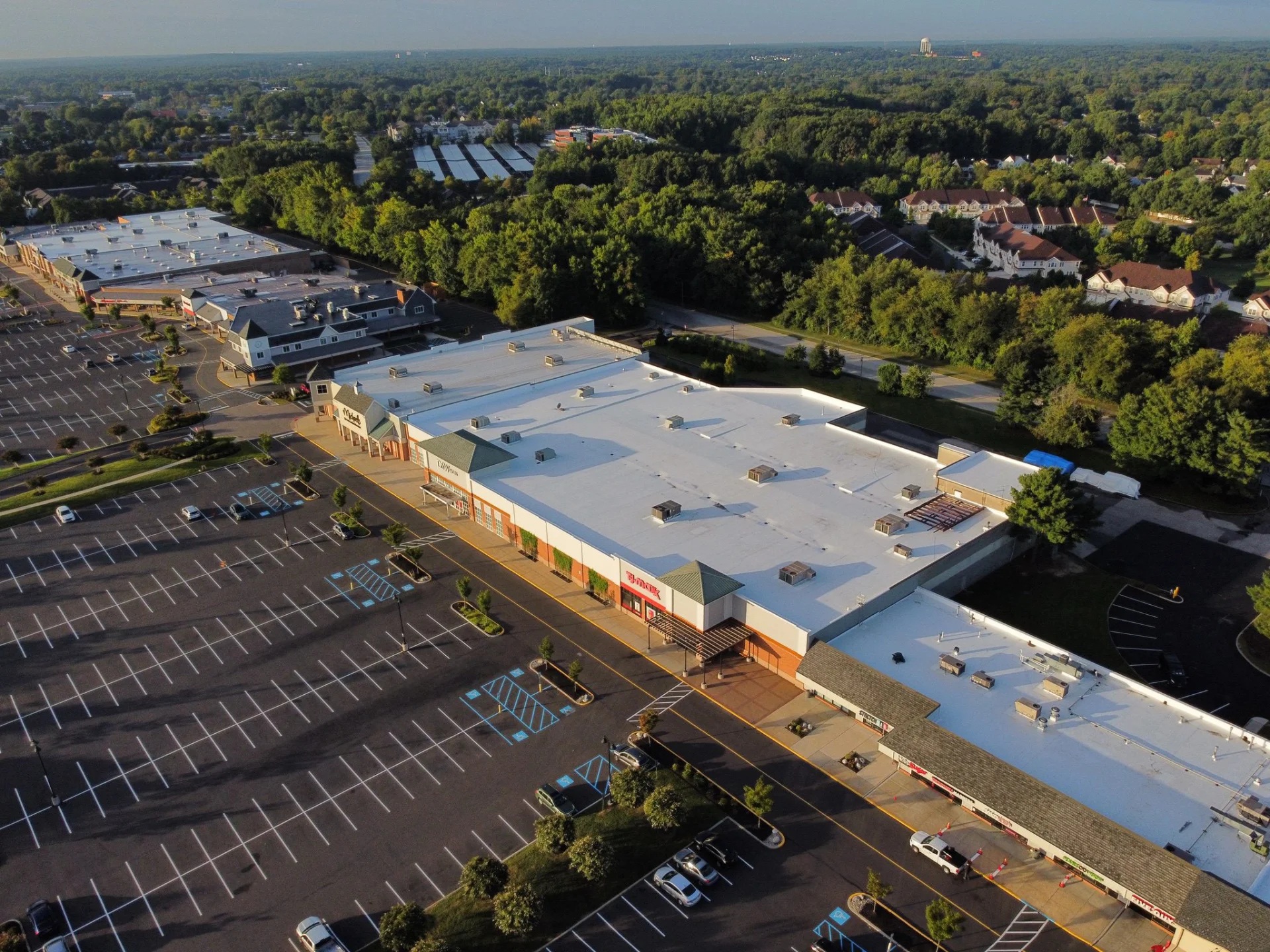 Commercial roof with rooftop mechanical equipment